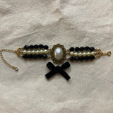 <tc>Girly Gothic Three Stranded Bracelet</tc>